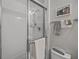 Shower with glass doors and chrome hardware in an updated bathroom at 41 Legare St # C, Charleston, SC 29401