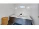 Luxurious bathroom boasts a large soaking tub, decorative sconces, and modern fixtures at 413 Station 22 1/2 St, Sullivans Island, SC 29482