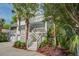 Charming two-story home with a welcoming porch, perfect for relaxing and enjoying the outdoors at 413 Station 22 1/2 St, Sullivans Island, SC 29482