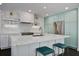 Contemporary kitchen features marble countertops, stainless steel appliances, and stylish cabinetry at 413 Station 22 1/2 St, Sullivans Island, SC 29482