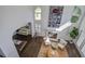 Living room view with a fireplace, large windows, and modern decor at 413 Station 22 1/2 St, Sullivans Island, SC 29482