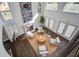 Bright living room with a fireplace, hardwood floors and ample natural light at 413 Station 22 1/2 St, Sullivans Island, SC 29482