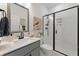 Modern bathroom featuring a sleek vanity, walk-in shower with glass door, and stylish decor at 4314 Grange Cir, Summerville, SC 29486