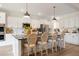 Modern kitchen with stainless appliances, an island with bar seating, and hardwood floors at 4314 Grange Cir, Summerville, SC 29486