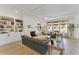 Spacious living room featuring a fireplace, built-ins, and large windows offering natural light at 4314 Grange Cir, Summerville, SC 29486