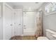 Bright bathroom featuring subway tile shower, with window at 4524 Orr St, North Charleston, SC 29405