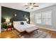 Cozy bedroom features hardwood floors, natural light, and decorative lighting at 4524 Orr St, North Charleston, SC 29405