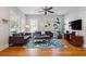 Stylish living room with hardwood floors, neutral walls, comfortable seating, and bright natural light at 4524 Orr St, North Charleston, SC 29405