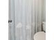 Cozy bathroom features a seashell-themed shower curtain and white toilet at 4856 Green Dolphin Way # Share 7, Kiawah Island, SC 29455