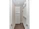 Well-organized walk-in closet with built-in shelves and drawers, maximizing storage space at 498 Albemarle Rd # 207, Charleston, SC 29407
