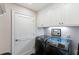 Bright and modern laundry room with front-loading machines and plenty of storage space at 498 Albemarle Rd # 207, Charleston, SC 29407