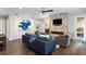 Comfortable living room featuring a fireplace, ceiling fan, and nice furniture at 498 Albemarle Rd # 207, Charleston, SC 29407