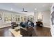 Bright living room featuring wood floors, neutral colors, and lots of natural light at 498 Albemarle Rd # 207, Charleston, SC 29407