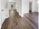 Bright and airy room shows entryways to a kitchen and bedroom, and lots of light at 529 Delafield Dr # 529, Summerville, SC 29483