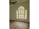 Neutral bedroom showing a big window looking out to the property at 638 Leisure Ln, Mount Pleasant, SC 29464