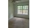 Neutral bedroom with a large window and ceiling fan at 638 Leisure Ln, Mount Pleasant, SC 29464