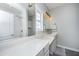 Well-lit bathroom with double vanity, modern lighting, and walk-in shower at 754 Certificate Ct, Charleston, SC 29414
