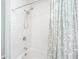 Modern bathroom showcasing white subway tiles, updated shower fixtures, and a tub at 754 Certificate Ct, Charleston, SC 29414