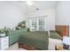 Comfortable bedroom featuring a queen size bed, ceiling fan, and dresser with decor at 754 Certificate Ct, Charleston, SC 29414
