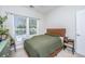 Comfortable bedroom featuring a queen size bed, ceiling fan, and night stand at 754 Certificate Ct, Charleston, SC 29414