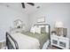 Comfortable bedroom featuring a metal bed frame, ceiling fan, decor, and dresser at 754 Certificate Ct, Charleston, SC 29414