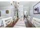 Charming dining area featuring a chandelier, wood table, and decor at 754 Certificate Ct, Charleston, SC 29414