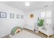 Bright Bedroom with neutral accents, a white crib, white glider, and a lion wall decoration at 78 Branch Creek Trl, Summerville, SC 29483