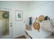 Functional mudroom with storage bench, hooks, and natural light at 78 Branch Creek Trl, Summerville, SC 29483