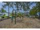Well-maintained playground with swings and various play structures, set in a secure and inviting community space at 78 Branch Creek Trl, Summerville, SC 29483
