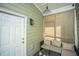 Cozy porch area with comfortable seating and outdoor privacy shades at 78 Branch Creek Trl, Summerville, SC 29483