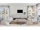 Bright living room featuring comfortable seating, stylish decor, and plenty of natural light at 782 Clay Field Trl, Summerville, SC 29485