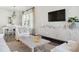 Inviting living room with stylish furnishings, a modern TV, and elegant decor at 782 Clay Field Trl, Summerville, SC 29485