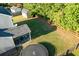 Aerial view of backyard with shed, trampoline, and covered patio seating area at 8035 Mckayla Rd, Summerville, SC 29483