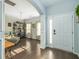 Bright living room features hardwood floors, ample natural light, and a welcoming atmosphere, perfect for relaxation at 8035 Mckayla Rd, Summerville, SC 29483