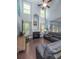 Bright living room with high ceilings, a fireplace, and a comfortable leather sofa at 8035 Mckayla Rd, Summerville, SC 29483