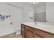 This bathroom has a toilet, sink, and mirror at 822 Rue Dr, Charleston, SC 29414