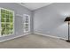 This bedroom has two windows that provide great natural light at 822 Rue Dr, Charleston, SC 29414