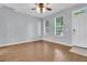 Bright living area with hardwood floors, neutral walls, and natural light at 822 Rue Dr, Charleston, SC 29414
