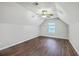 Lofted bedroom with vaulted ceiling, window, and wood floors at 8632 Madelyn St, North Charleston, SC 29406