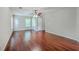Large, empty bedroom offers hardwood floors and natural lighting at 8632 Madelyn St, North Charleston, SC 29406