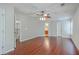 Spacious bedroom featuring ceiling fan and hardwood floors at 8632 Madelyn St, North Charleston, SC 29406