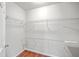 Walk-in closet with wire shelving and hardwood floors at 8632 Madelyn St, North Charleston, SC 29406
