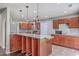 Open kitchen with granite countertops, stainless steel appliances, a breakfast bar, and ample cabinet space at 8632 Madelyn St, North Charleston, SC 29406