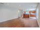 Open-concept living area with hardwood floors, recessed lighting, and easy access to a modern kitchen at 8632 Madelyn St, North Charleston, SC 29406