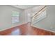 Living Room featuring beautiful hardwood floors, and a staircase at 8632 Madelyn St, North Charleston, SC 29406