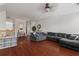 A cozy living room featuring hardwood floors, comfortable seating, and elegant décor at 9206 Southern Oak Ln, Ladson, SC 29456
