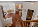 Spacious living room with beautiful hardwood floors, seamlessly connecting to the dining area and kitchen at 9206 Southern Oak Ln, Ladson, SC 29456