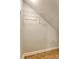 Image of a closet with white walls, wire shelving and hooks, and wood-look vinyl floor at 9418 Sweep Dr, Summerville, SC 29485
