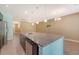 Modern kitchen with granite countertops, stainless steel appliances, and a large island with a sink and bar seating at 9418 Sweep Dr, Summerville, SC 29485