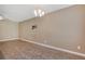 Open concept living room with wood floors and neutral paint, perfect for Gathering gatherings and entertaining guests at 9418 Sweep Dr, Summerville, SC 29485